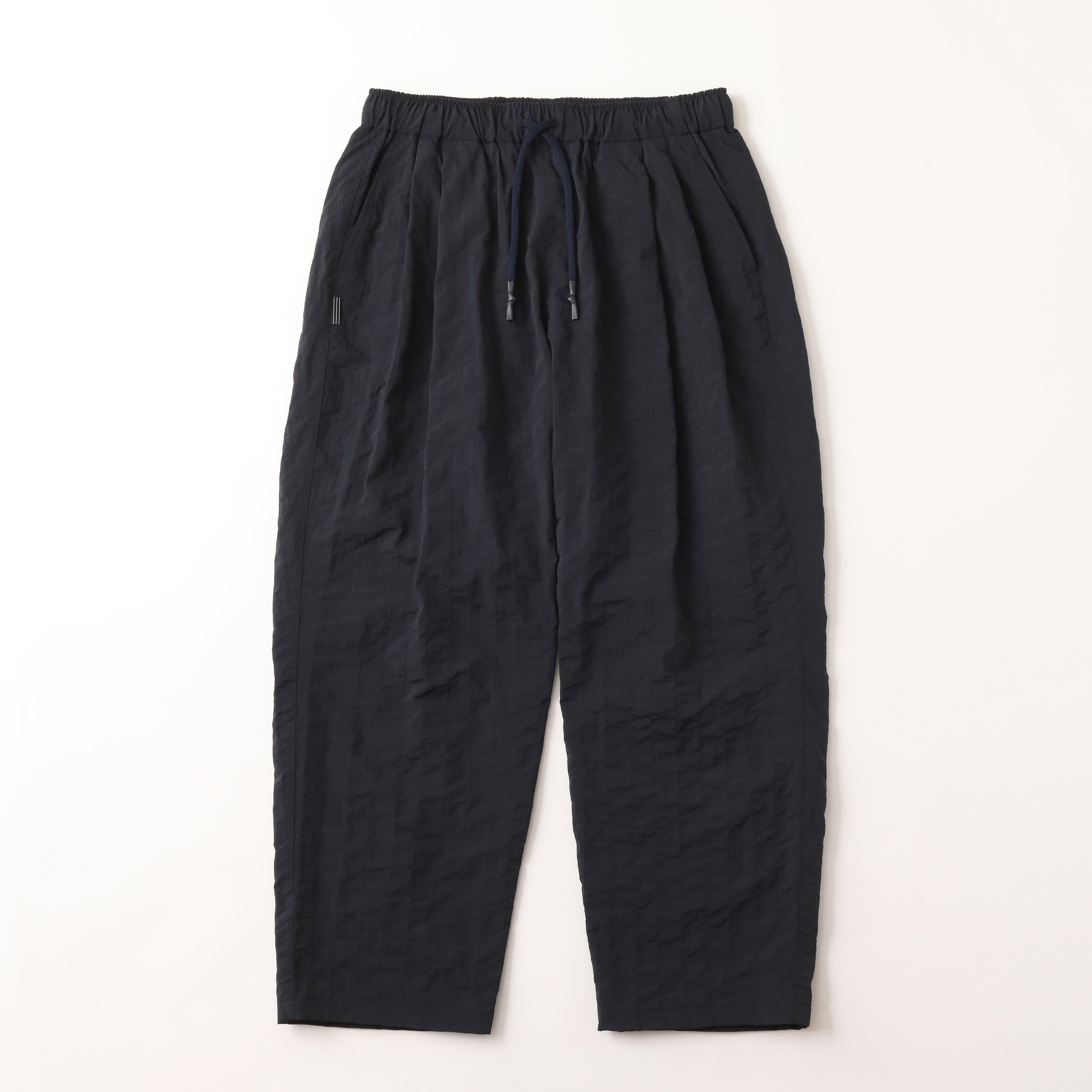 S.F.C NEW WIDE TWO TUCK PANTS (STITCHED NYLON) - D NAVY – STUDY