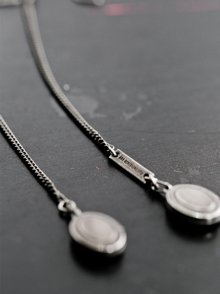 ANN DEMEULEMEESTERオーバルロケットペンダントチェーンピアス SILVER