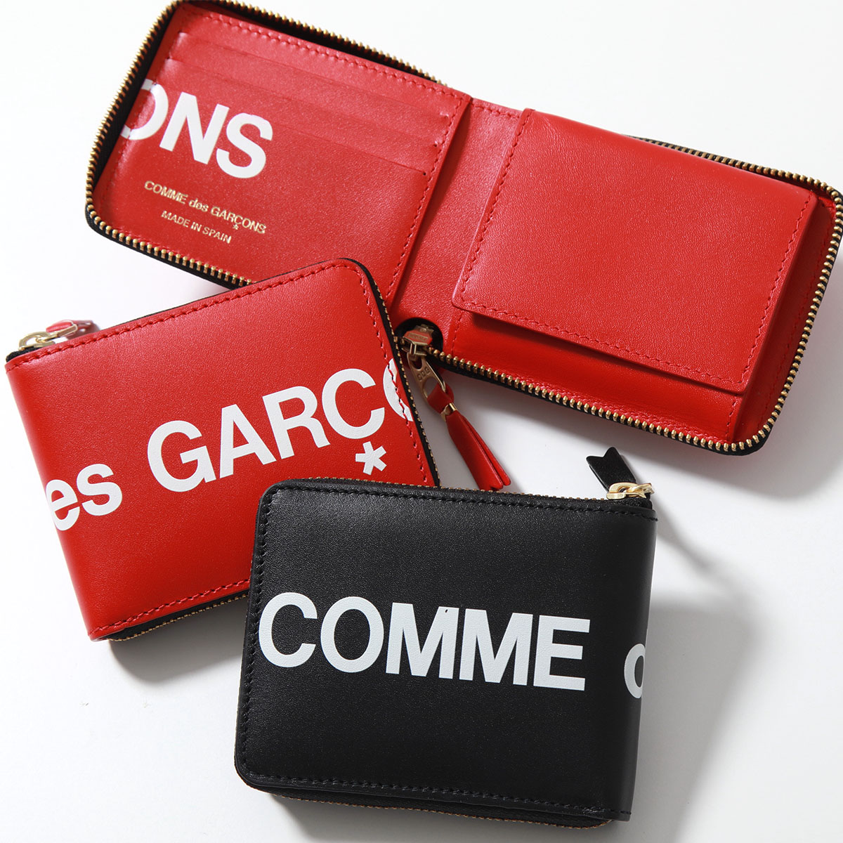 楽天市場】COMME des GARCONS コムデギャルソン 二つ折り財布 HUGE