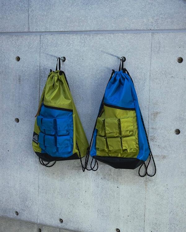 ネクサスセブン×ジェネラルリサーチ×グレゴリー“ナップサック”型バック