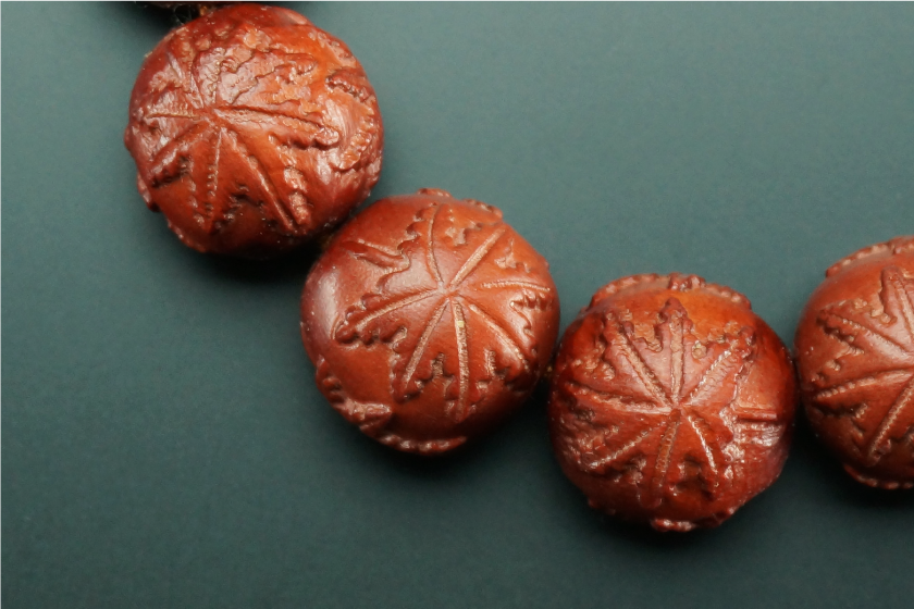 事例紹介 HK-94 柘植紅葉彫 片手18玉 瑪瑙仕立 四ﾂ目(6本)｜京都 京