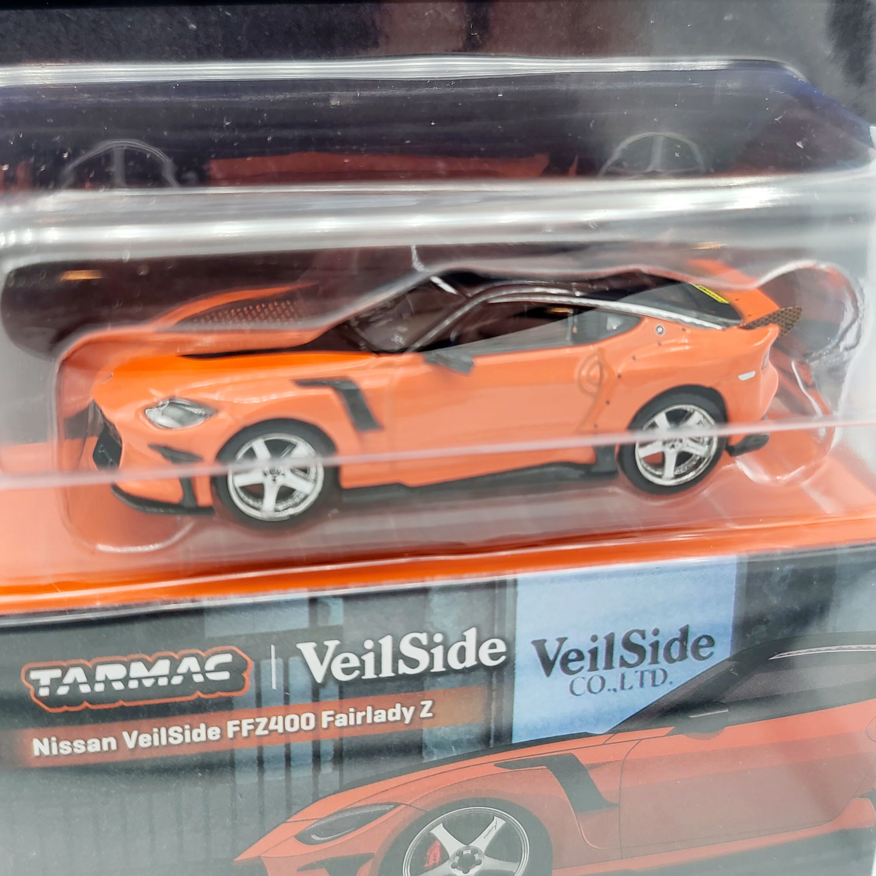 Tarmac Works Nissan Veilside FFZ400 Fairlady Z - 1:64, Orange (2025 Gl
