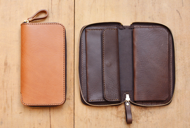 一回り大きなファスナー長財布は収納力がありマルチケースとしても活躍