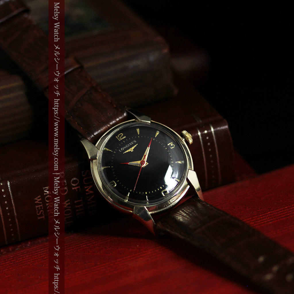 ロンジンのアンティーク腕時計 黒い文字盤に赤のエッセンス