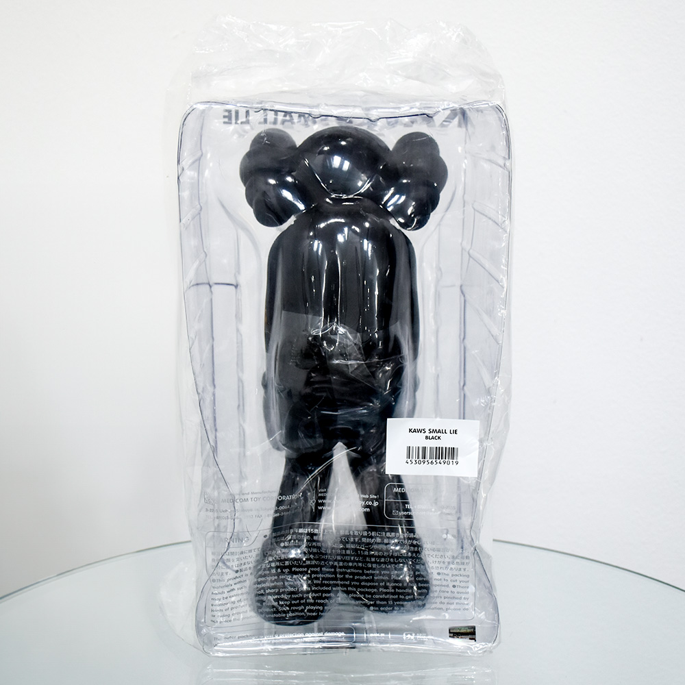 KAWS SMALL LIE BLACK SCULPTURE • Silverback Gallery
