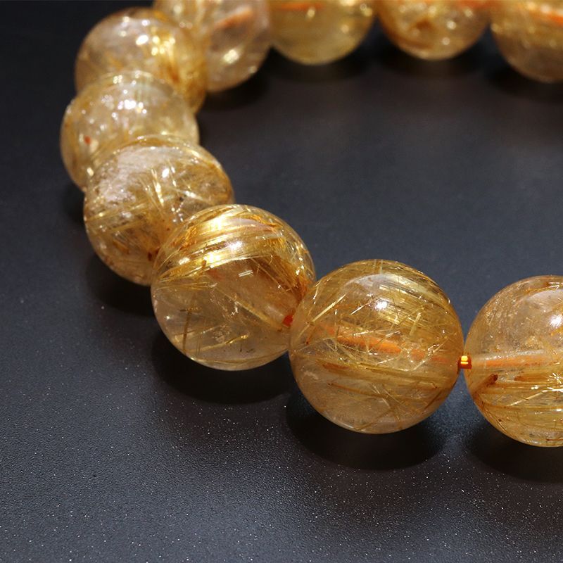 ブレス ルチルクォーツ＜ブラジル産＞ 丸 約14.5mm 金運 財運