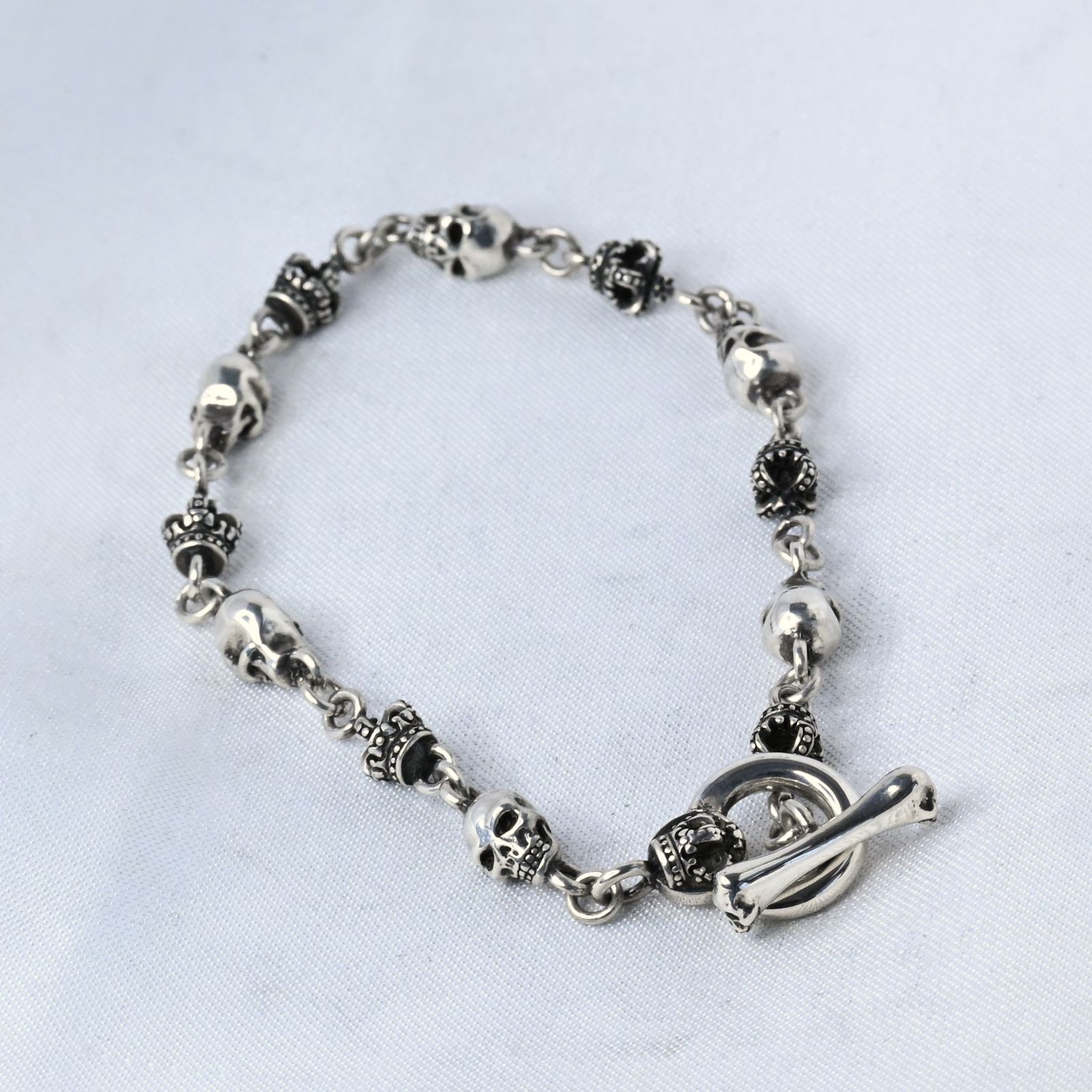 研磨済】JUSTIN DAVIS SKULL DIVINE ブレスレット Sサイズ SBJ126