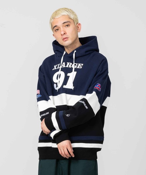 XLARGE（エクストララージ）の「TEAM PANELED HOODED SWEAT（パーカー