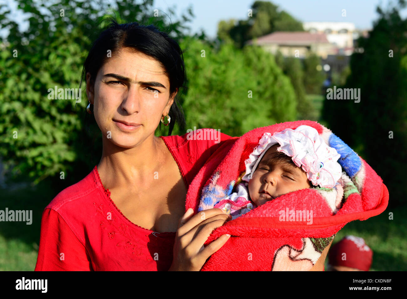 A Gypsy woman with her baby Stock Photo - Alamy