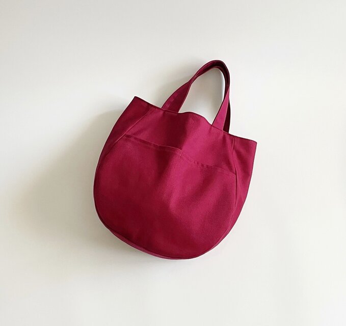 ワインレッド ラウンド型バッグ カツラギデニム 外ポケット ボルドー