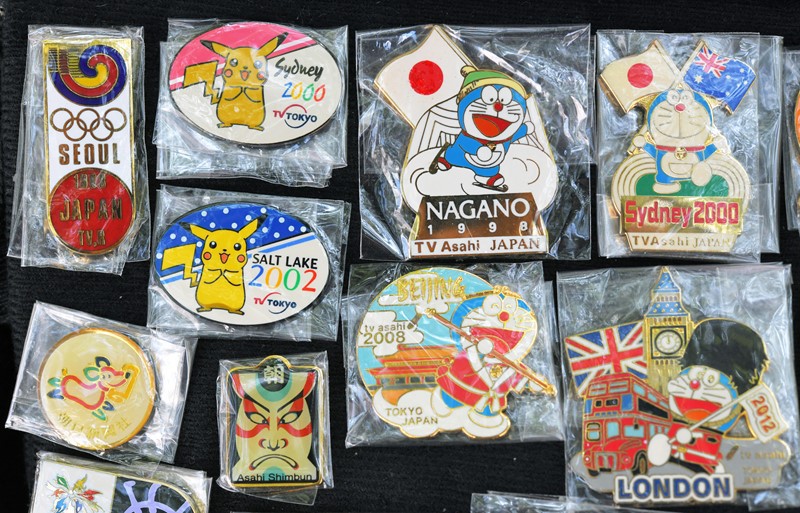 新型コロナ：五輪バッジ交換、絶やしたくない 「非公式競技」失われた