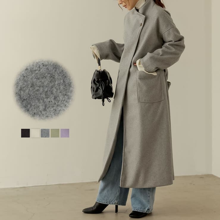 高めの襟がモードな印象に ラップデザインフェイクウールロングコート