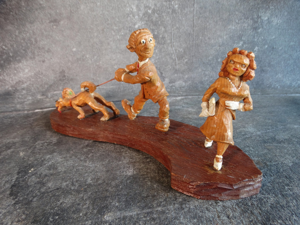 American Folk Art Wooden Carved Figures: A Wolf Walking His Dog