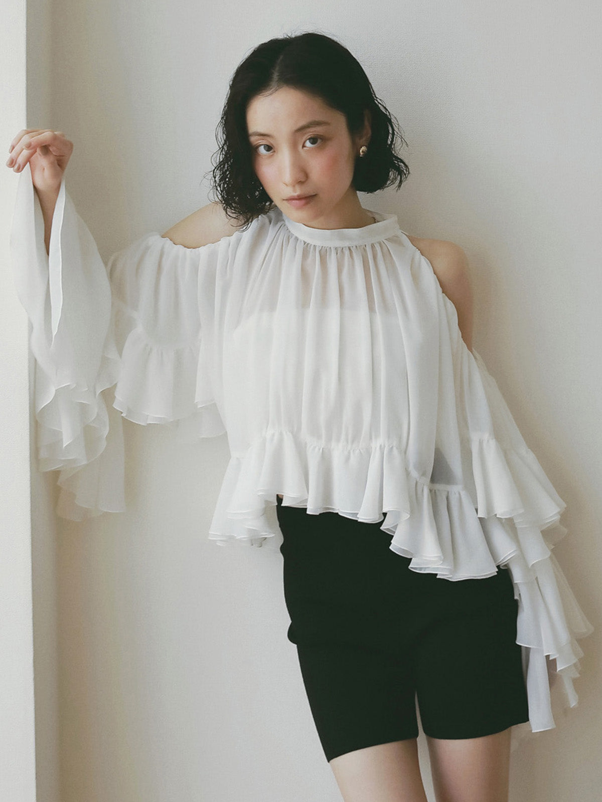 ラッフルトップス