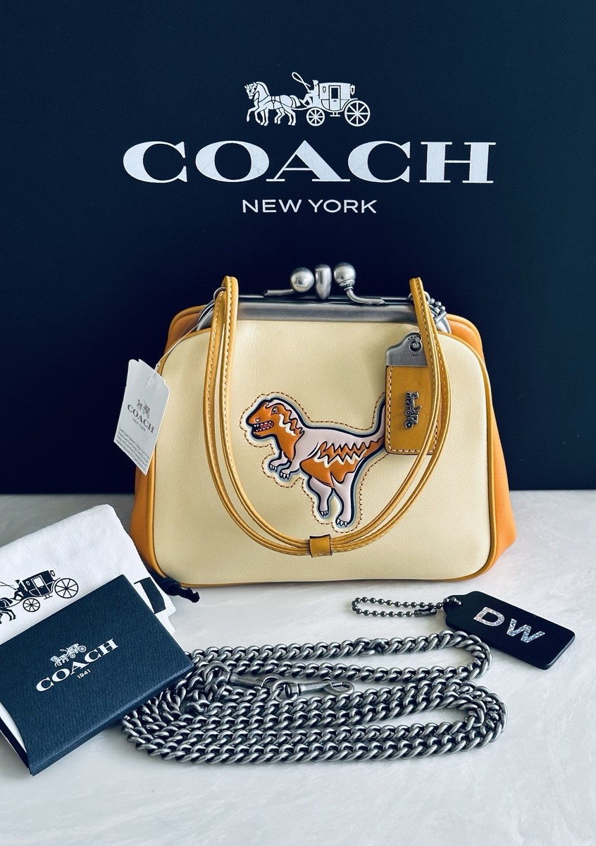 NWT COACH 1941 PALE YELLOW REXY KISSLOCK FRAME SATCHEL NICKEL