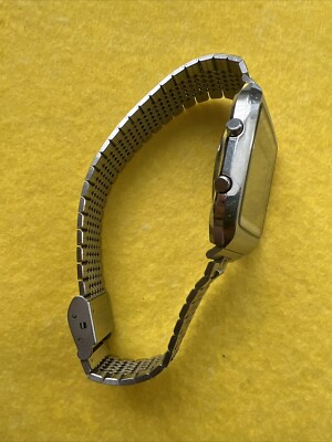 VINTAGE RICOH 840002 RIQUARTZ-LCD WATER RESISTANT ALL STAINLESS