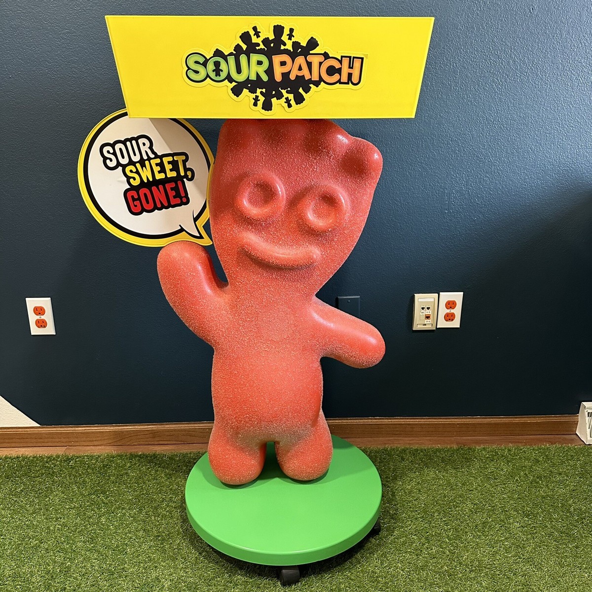 Red Sour Patch Kids Sign Character Plastic Rolling Store Display