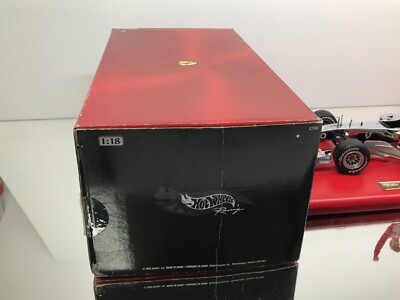 HOTWHEELS C7332 FERRARI F2003-GA F1 #1 SCHUMACHER -CHROME 1:18