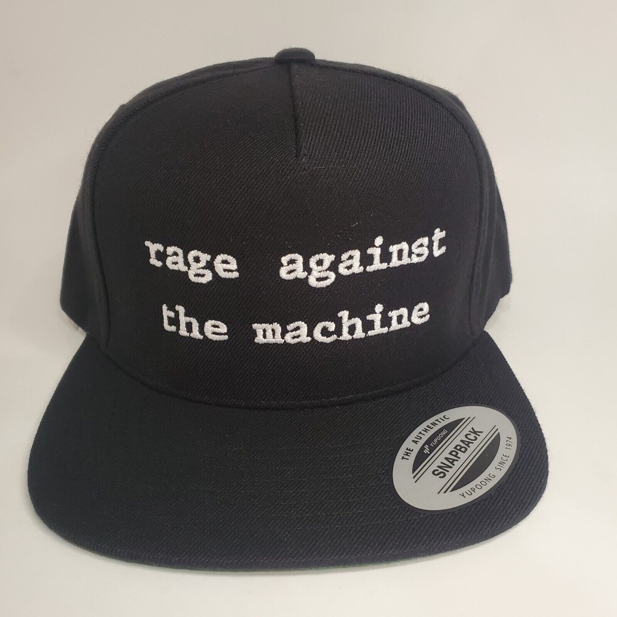 Rage Against The Machine Spellout Adult Black Snapback Hat Cap