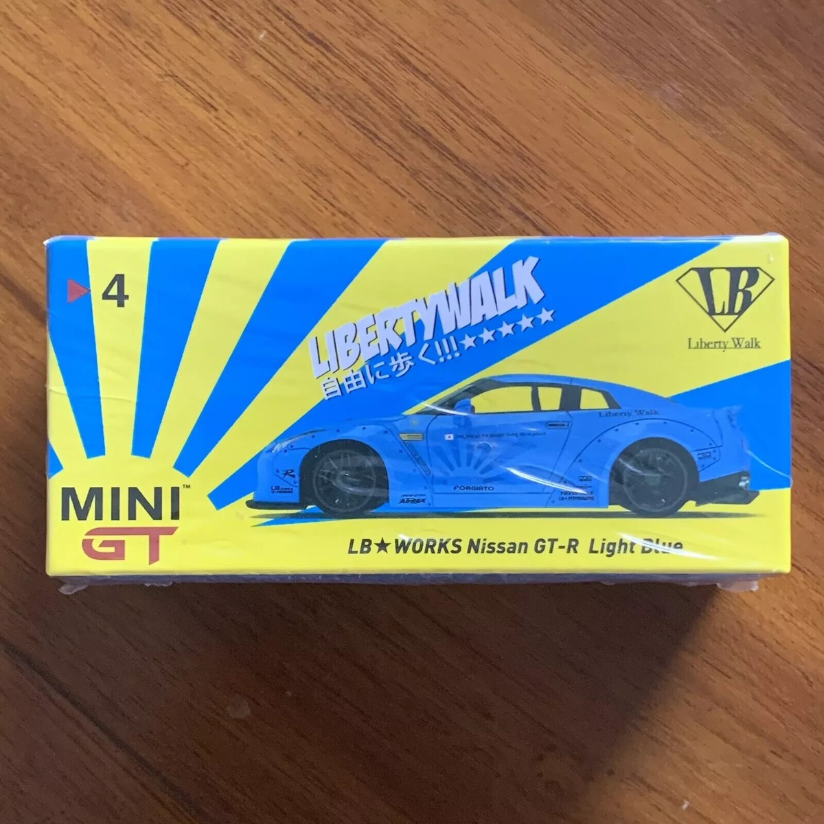 MINI GT 4 LB WORKS Nissan GT-R (R35) Light Blue Type 1, Rear Wing