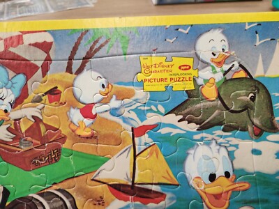 Vintage Walt Disney Children's Puzzle Donald Duck family sea shore