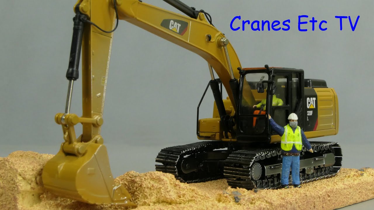 Diecast Masters Caterpillar 320F 'Weathered' by Cranes Etc TV