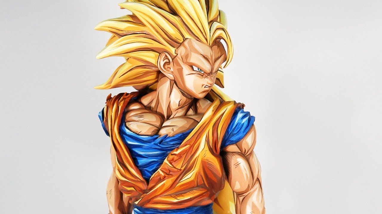 A figure painter tries his best to make Goku look cooland he