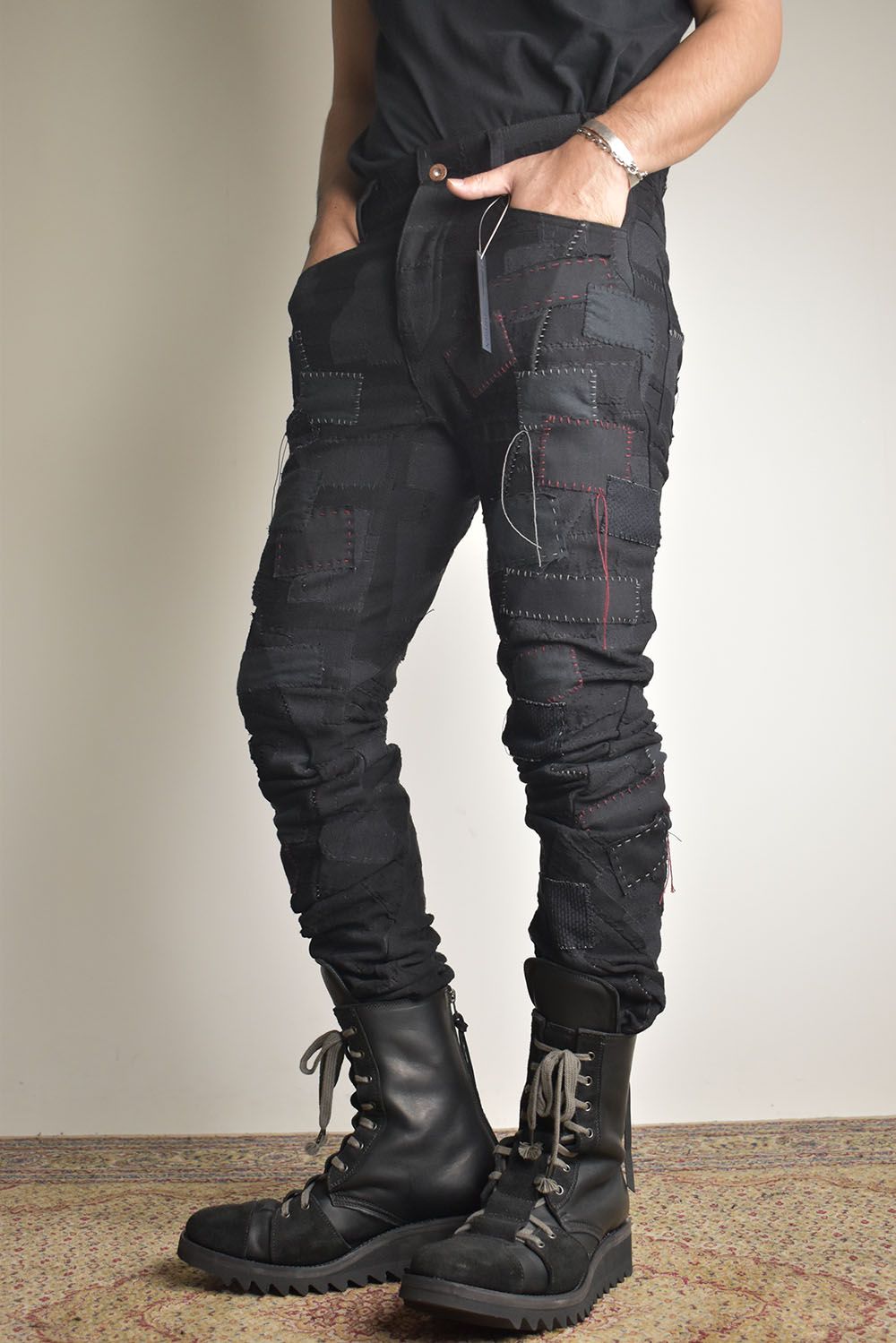 D.HYGEN - Hand Patchwork Crust Jacquard Overlock Twist Curve Pants