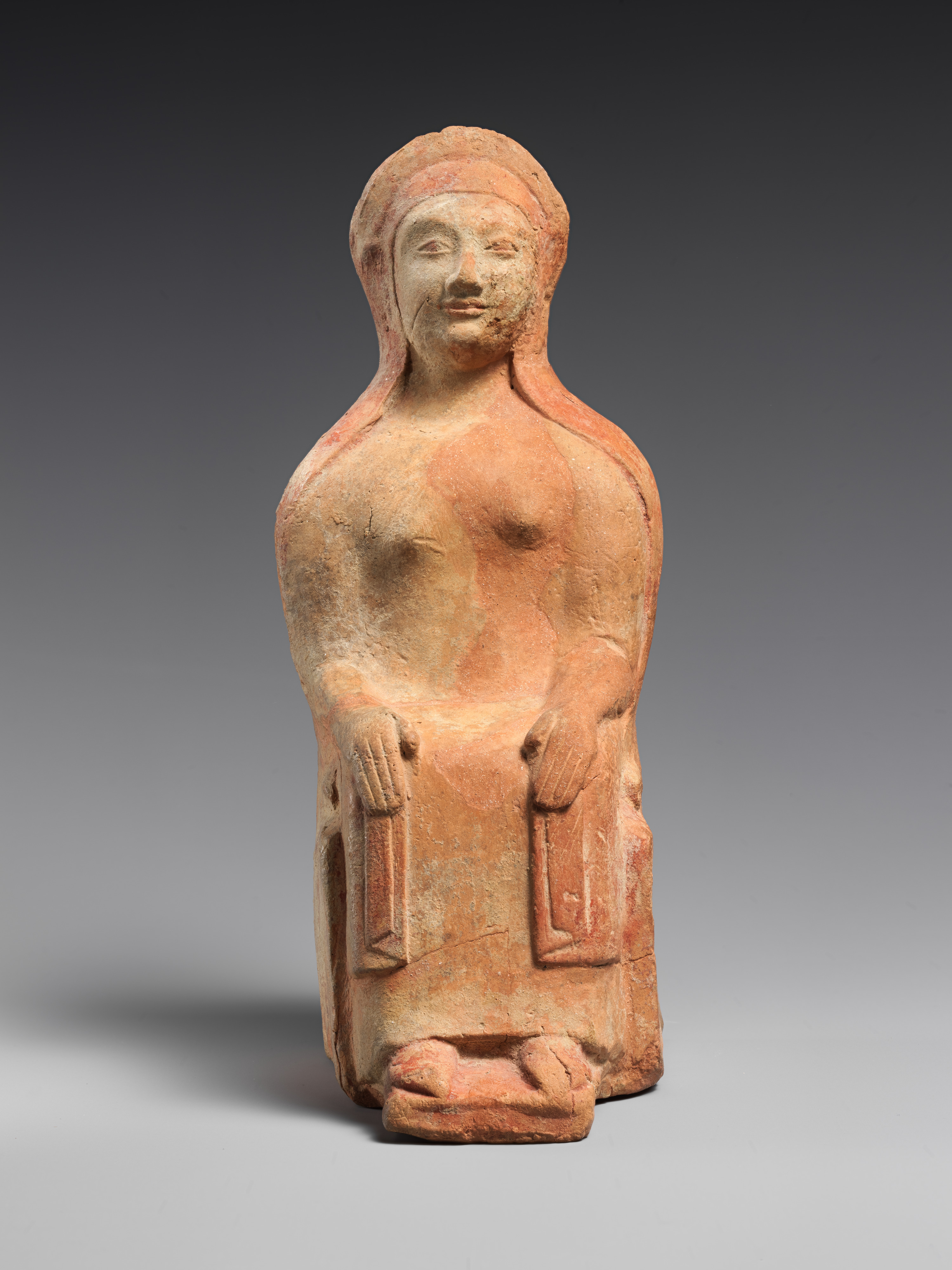 Terracotta statuette of a seated woman - Greek, Rhodian - Late