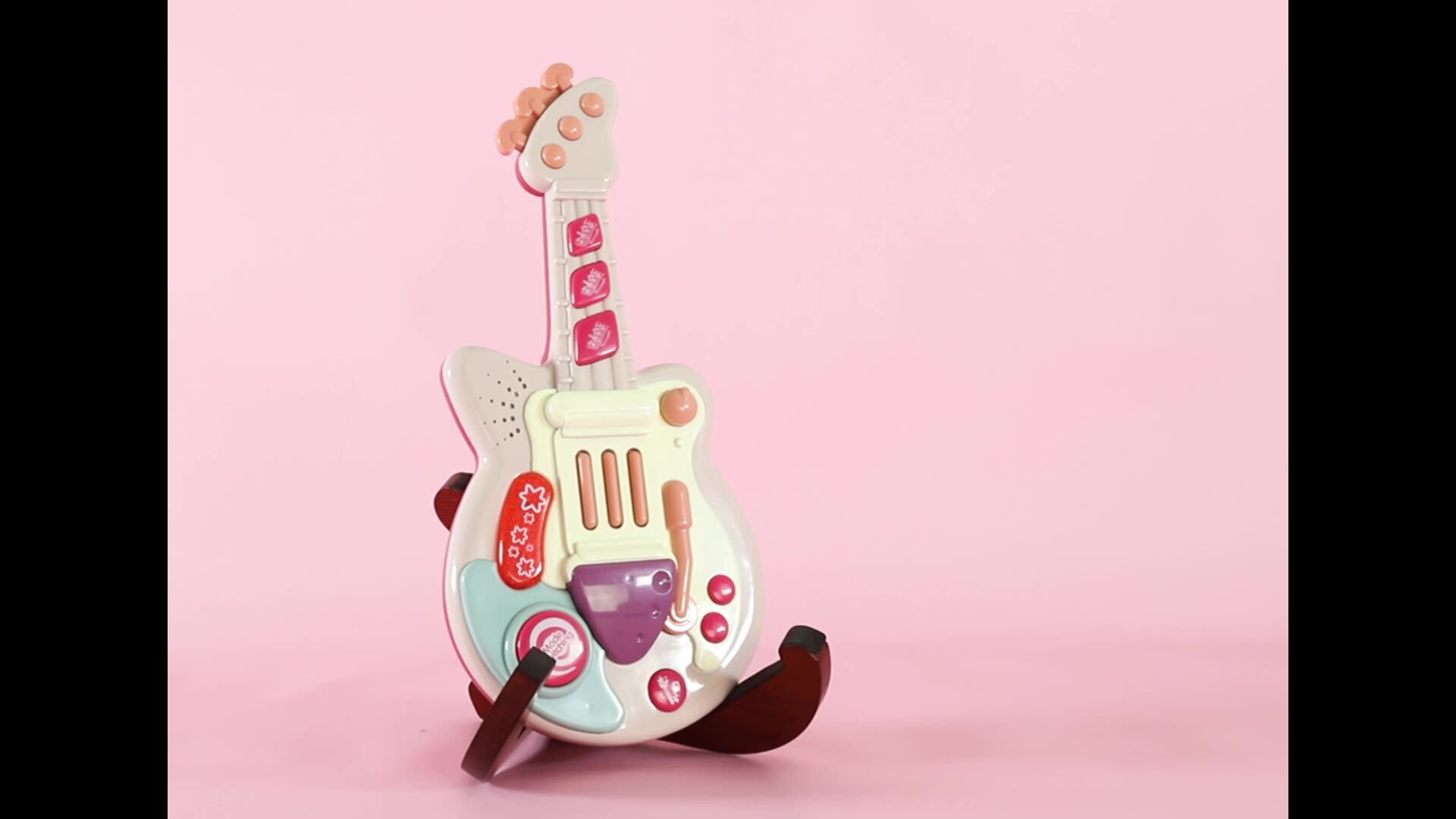 ピンク色のプリンセスおもちゃプラスチックギター楽器