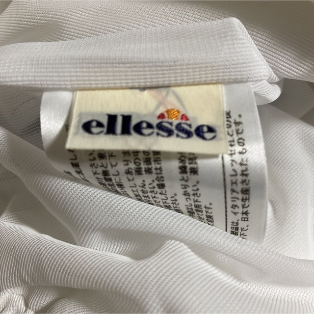 ellesse - エレッセ パンツ ユニセックスLサイズ ホワイト×ネイビーの