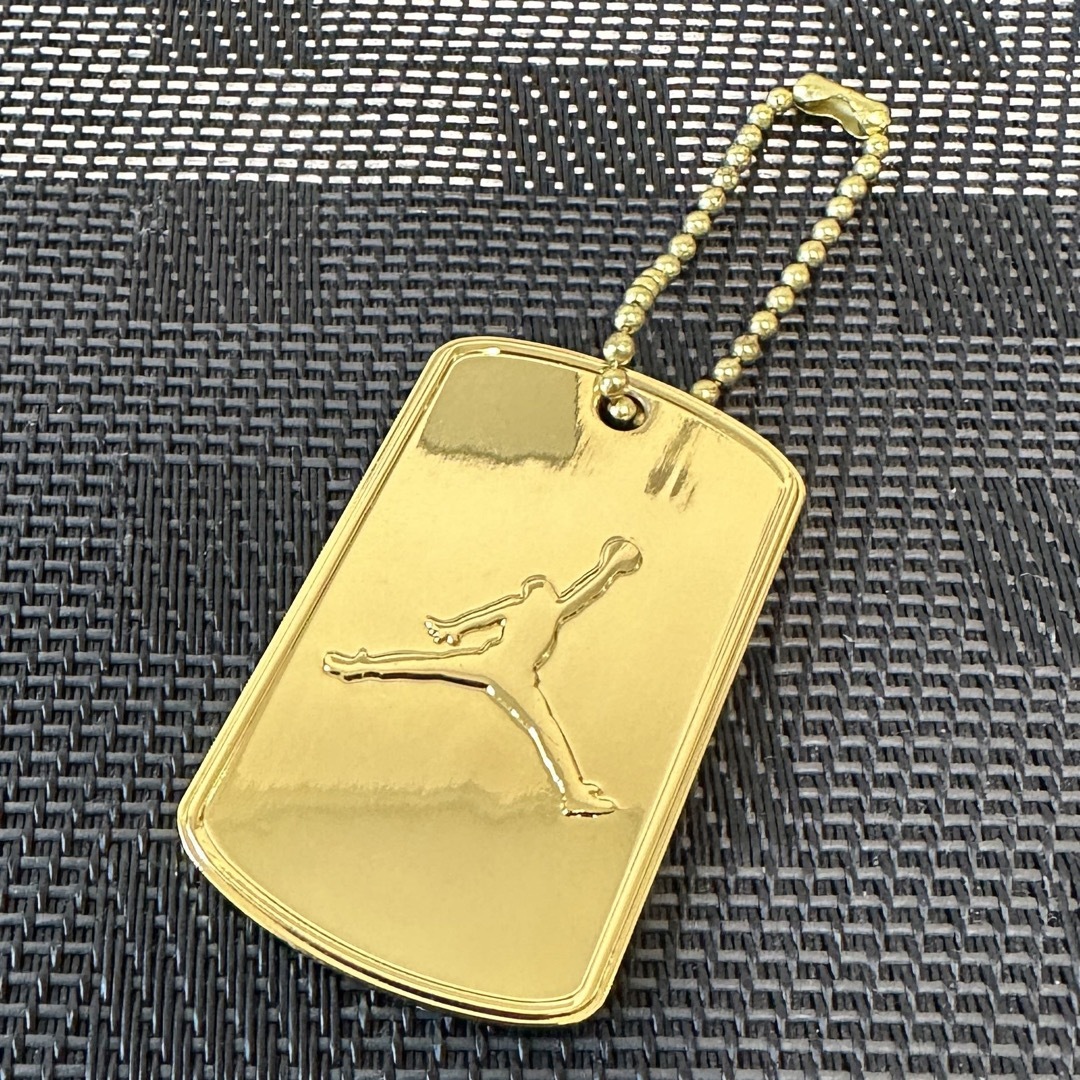 Jordan Brand（NIKE） - エアジョーダン タグ ゴールドの通販 by