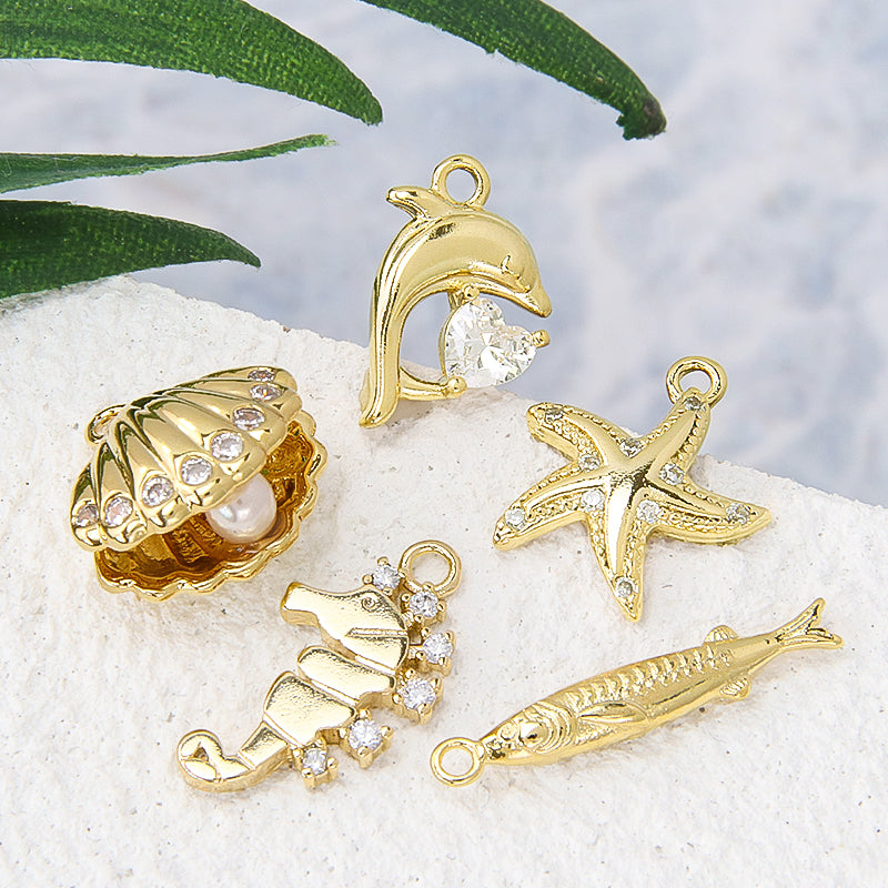 チャーム キュービックジルコニア イルカハート ゴールド – 貴和製作所