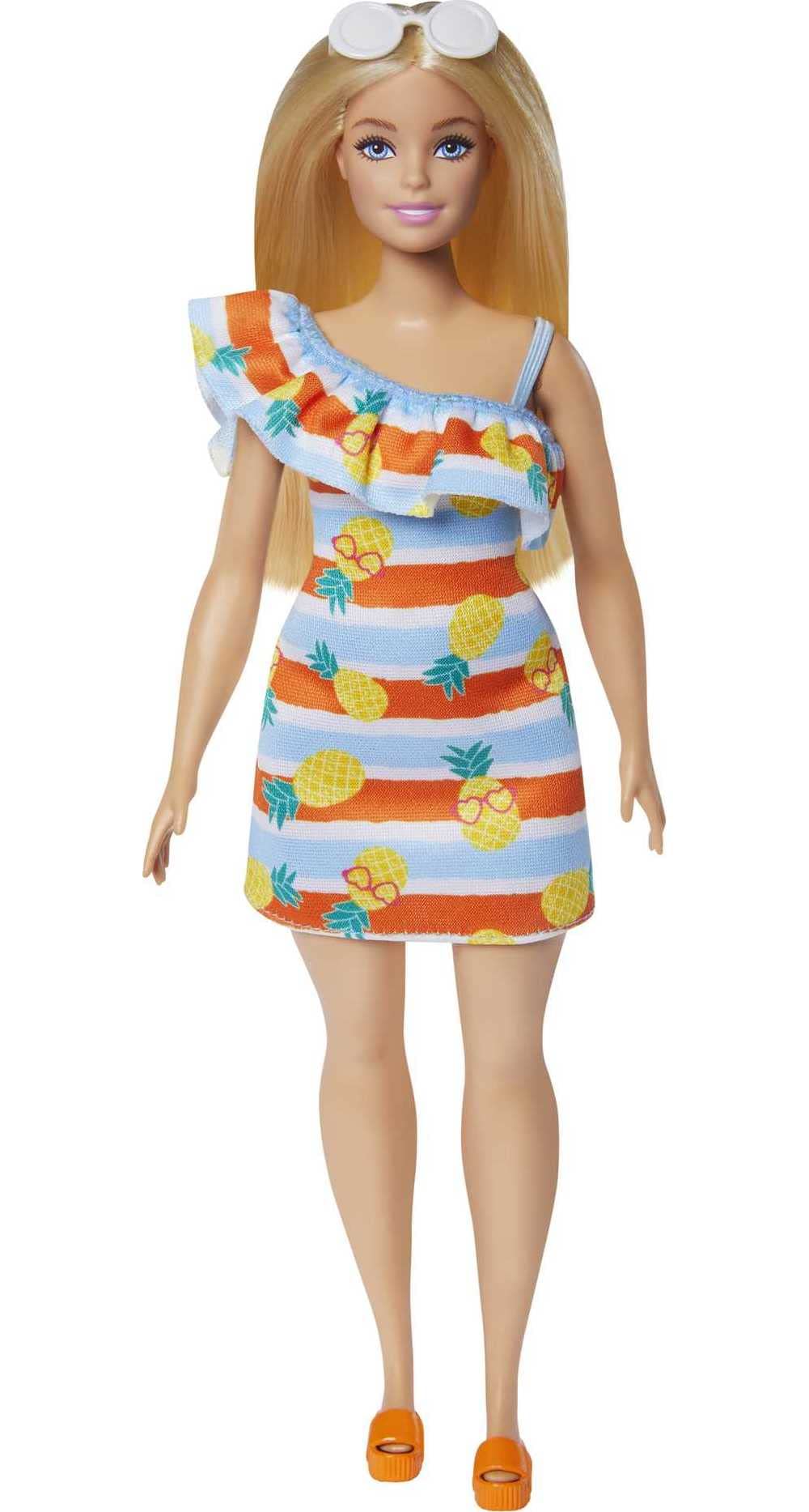 Amazon.com: Barbie Loves the Ocean Doll with Blonde Hair Wearing