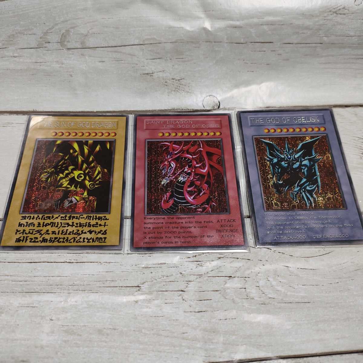 Amazon.co.jp: 神のカード 三幻神 原作版 漫画 コミック 遊 戯王