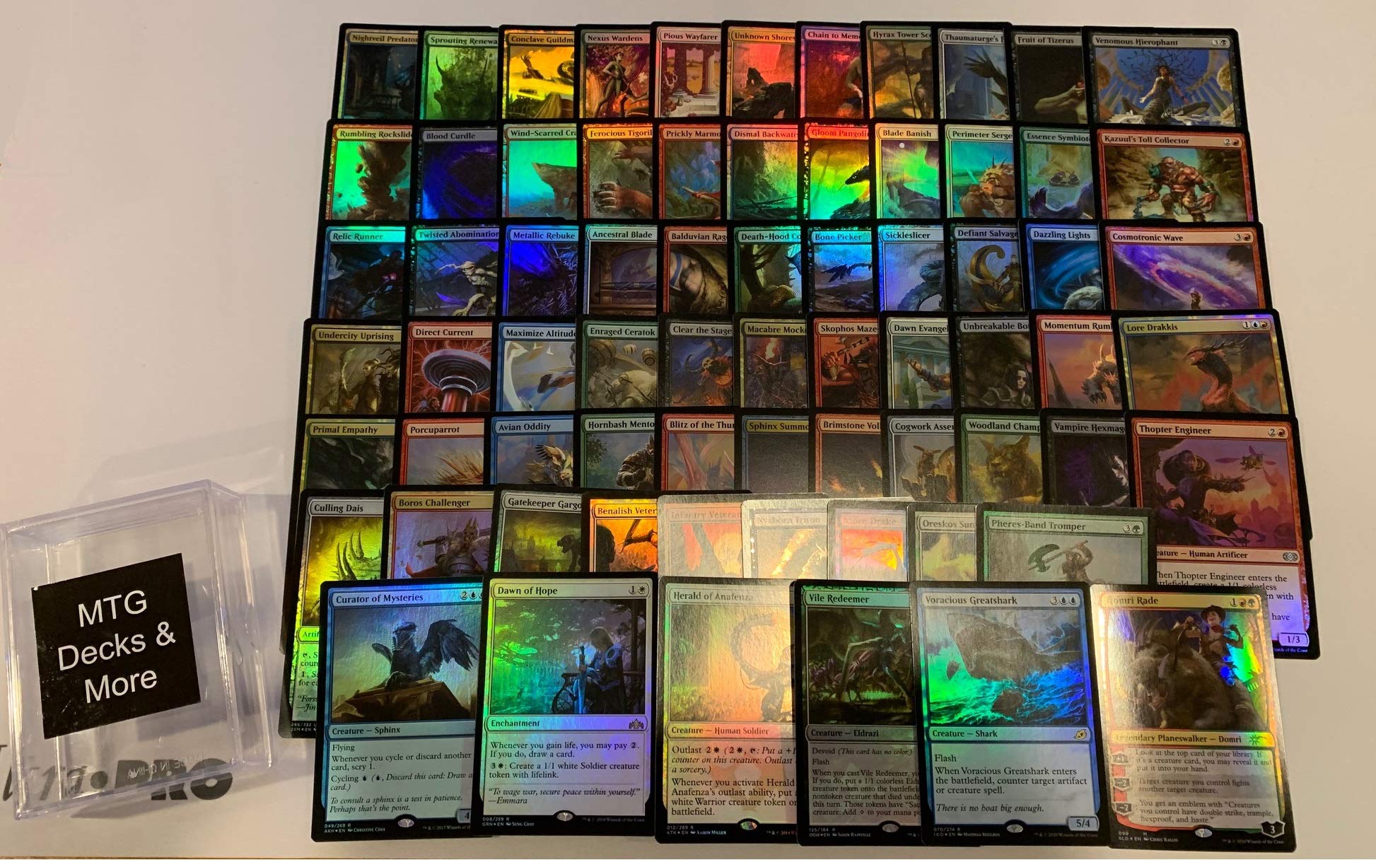 Amazon.com: MTG Foil Collection - 70 Magic Cards: 1 Planeswalker