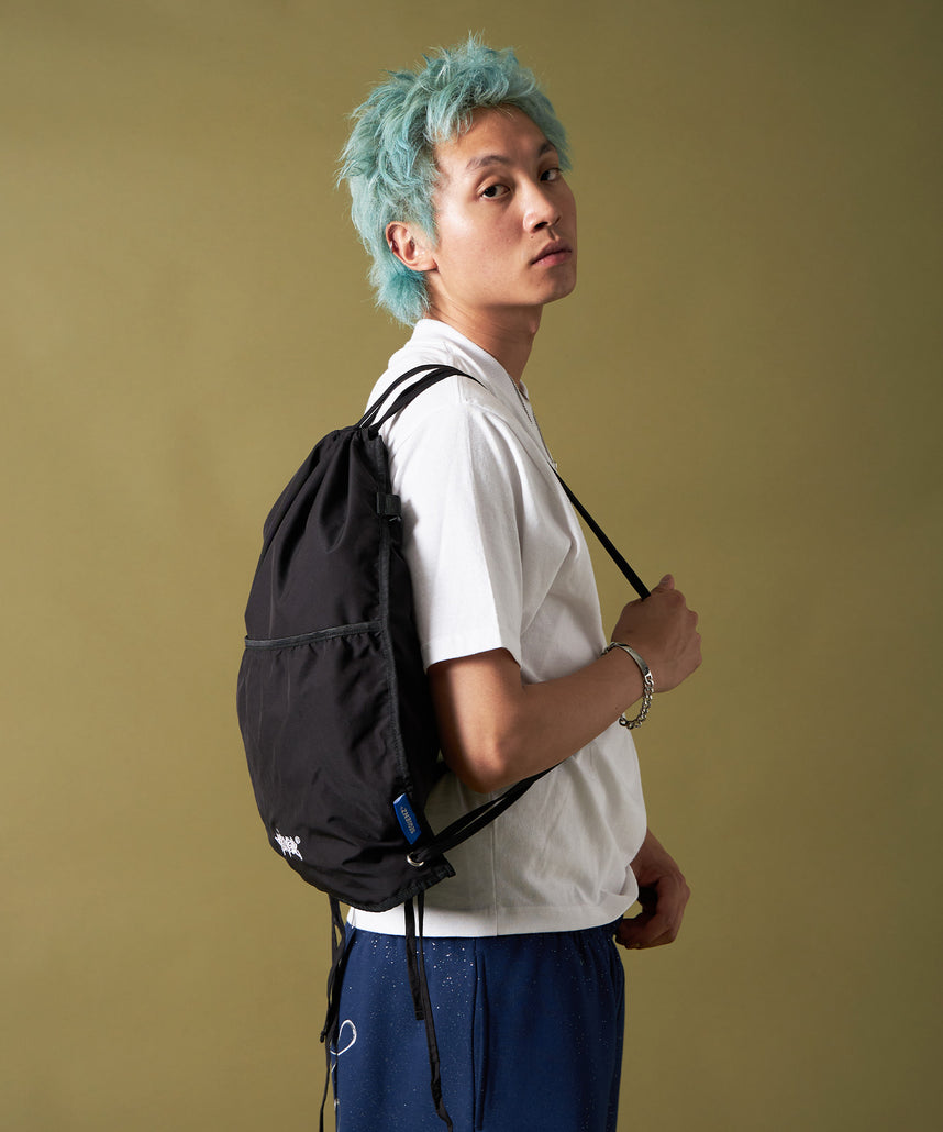 SEQUENZ 2 FACE STRING KNAPSACK / リバーシブル テック ナップサック