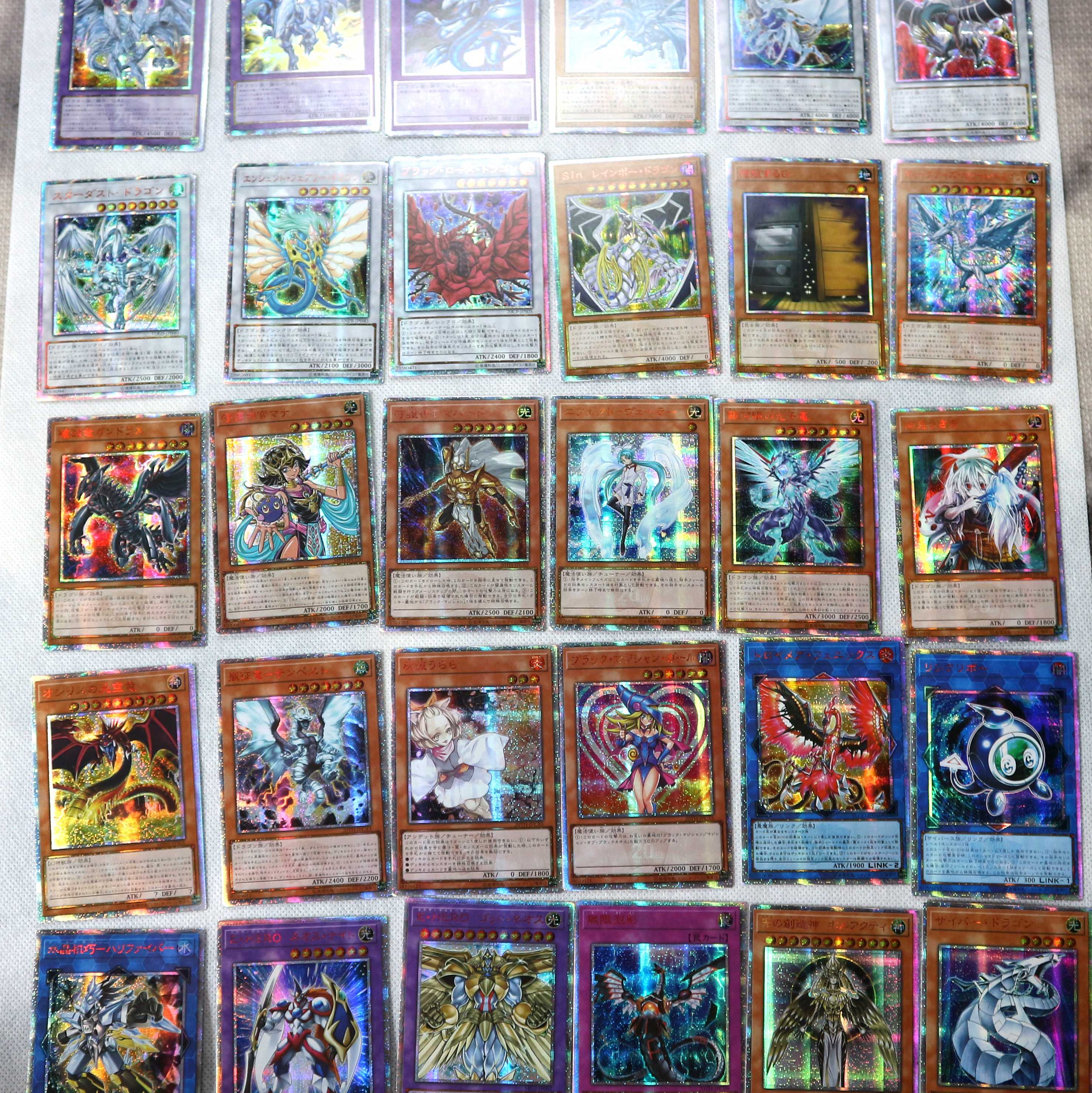 遊戯王 20周年 56枚セット 海外製 ブルーアイズ メタルカード入 30枚の