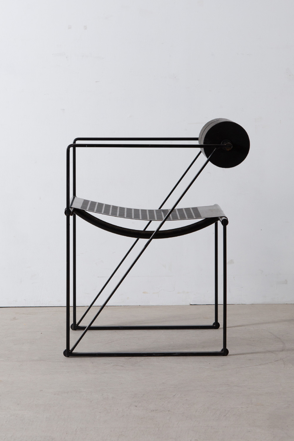 stoop | “SECONDA” Chair by Mario Botta for Alias in Steel