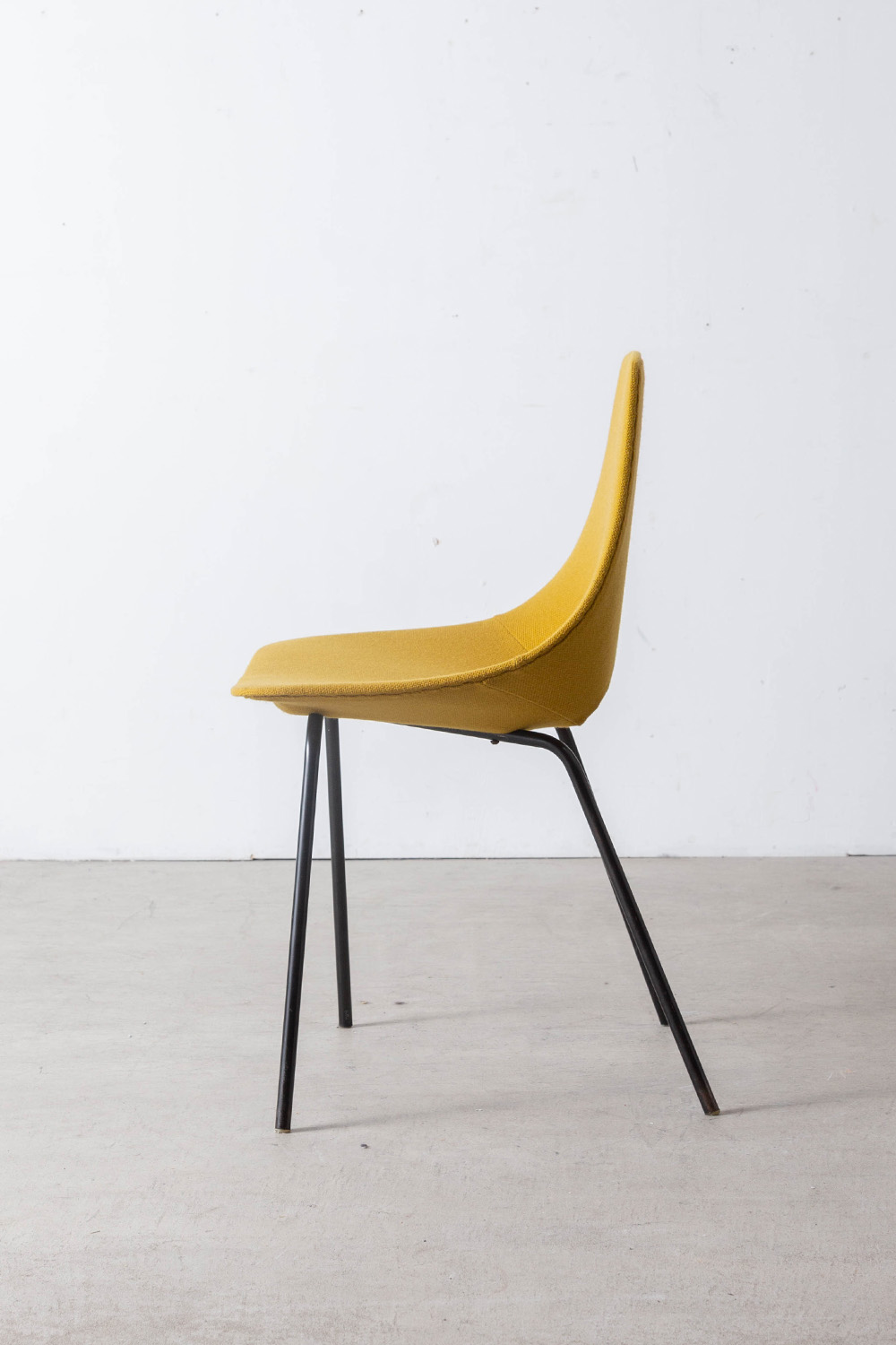 stoop | 'Amsterdam' Chair by Pierre Guariche for Stainer in Yellow