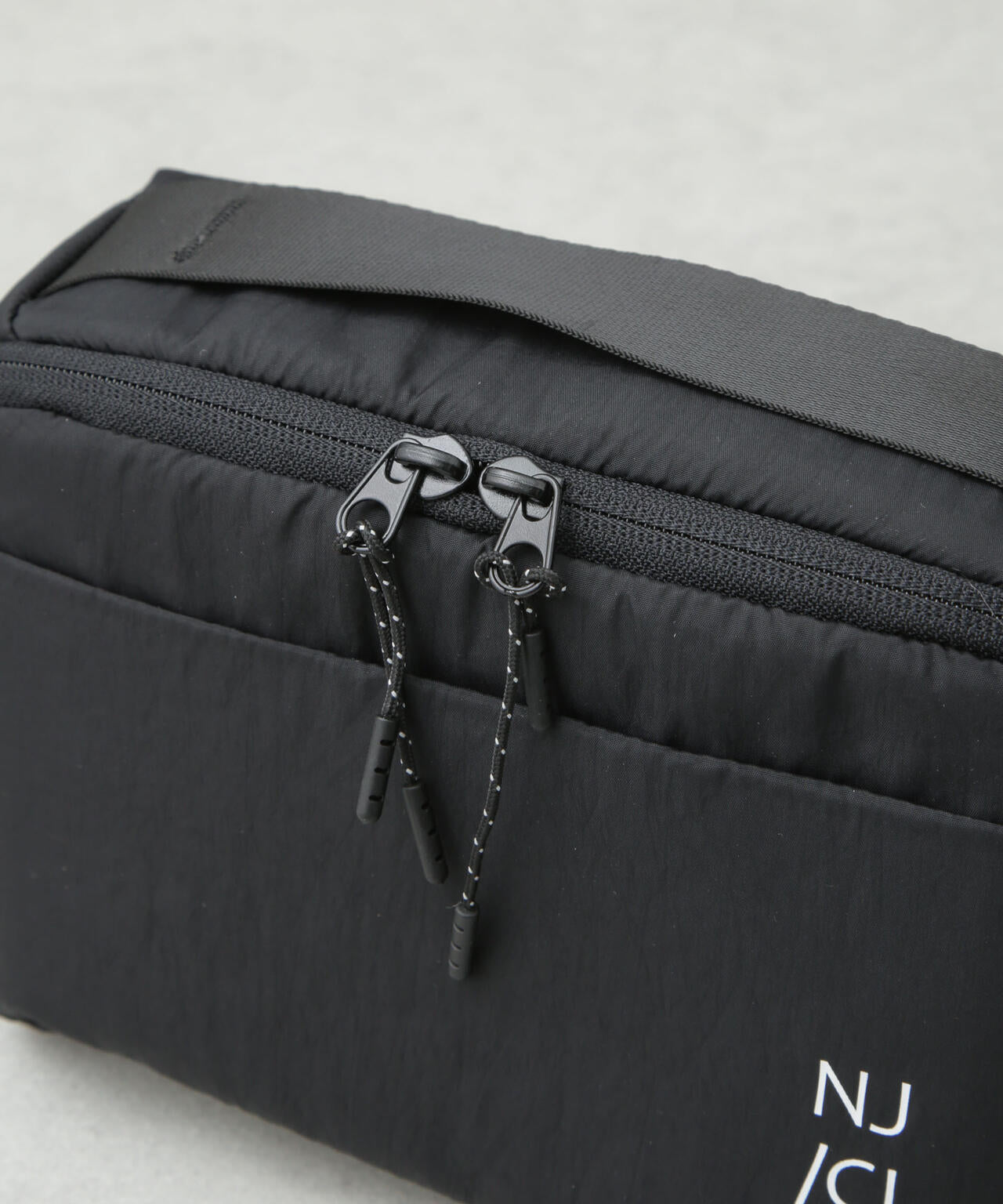 NJ/CLUB｣コンパクトトラベルポーチ