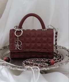 ダーリッチ DRチャームチョコレートハンドバッグ - メルカリ