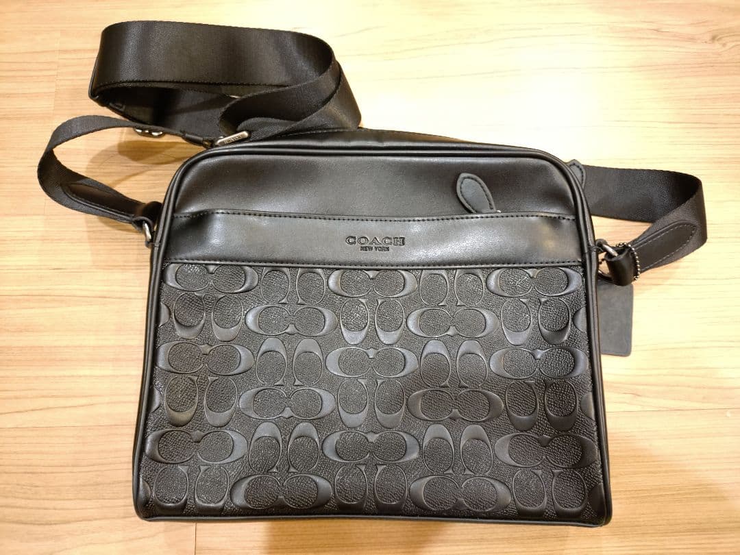 COACH シグネチャーレザー フライトバッグ