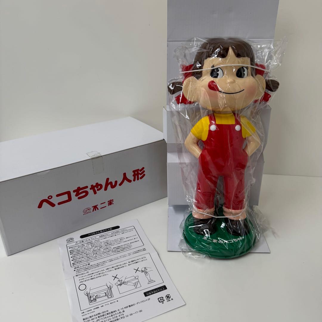 不二家のペコちゃん首ふり人形 - メルカリ