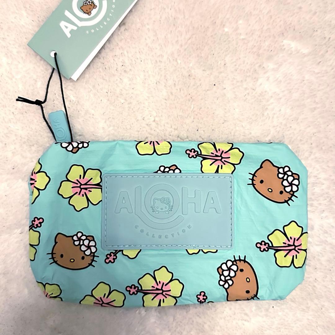 新品 アロハコレクション 日焼けキティ ハワイ限定 ポーチ - メルカリ