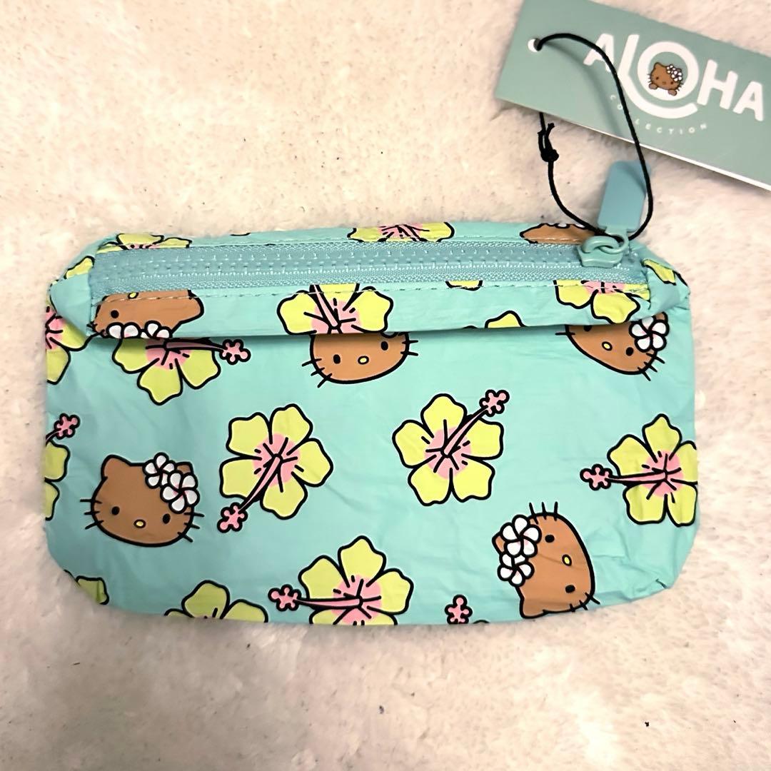 新品 アロハコレクション 日焼けキティ ハワイ限定 ポーチ - メルカリ
