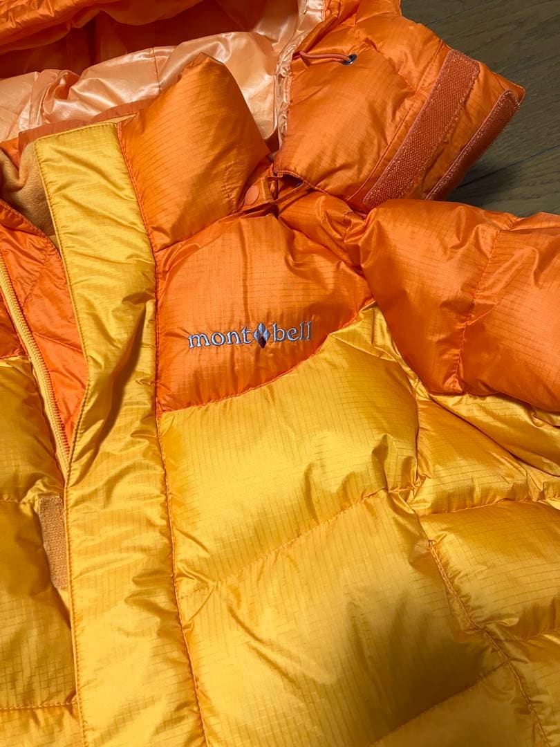 mont-bell フード付きダウンジャケット オレンジ/イエロー