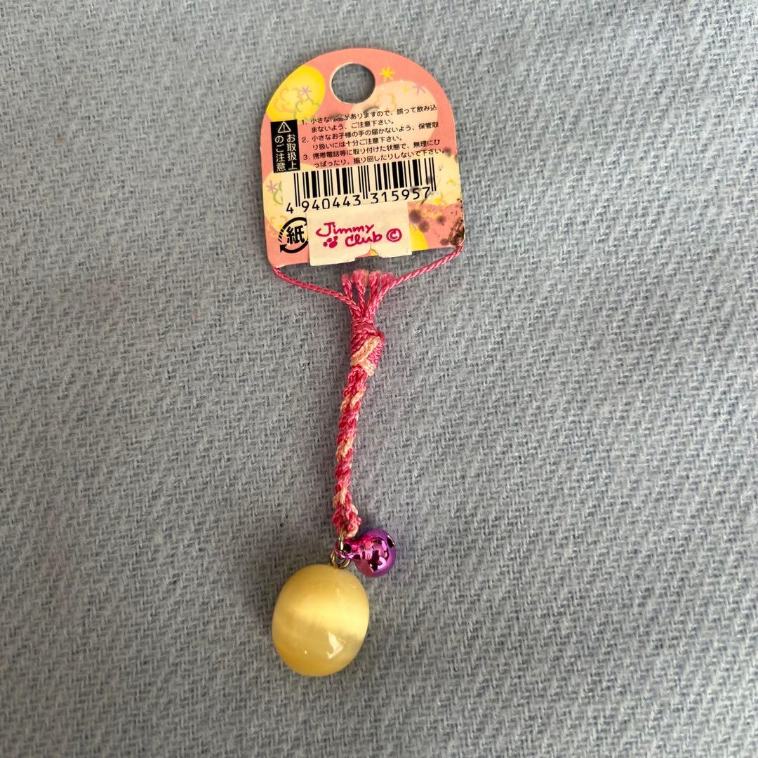 草津 温泉たまご キャッツアイ ストラップ 鈴付き タグ付き - メルカリ