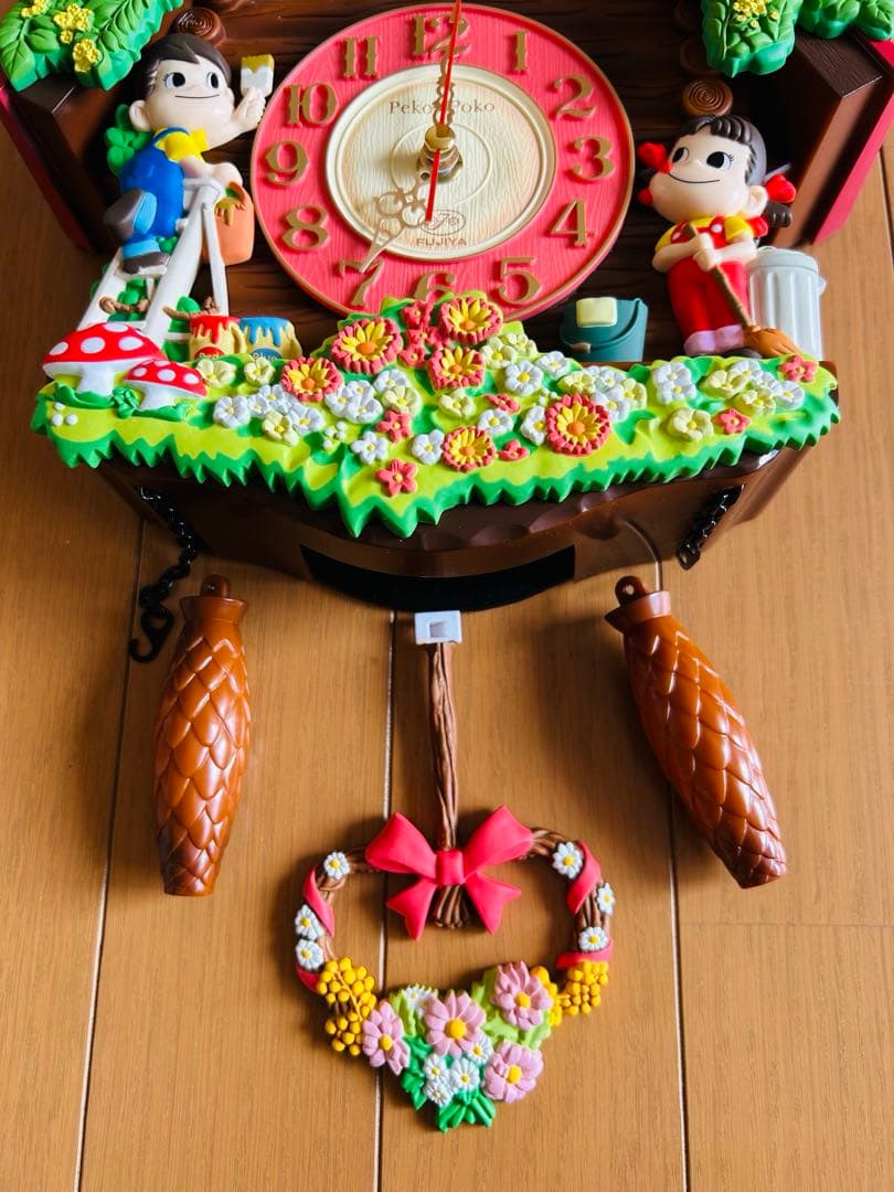 動作確認済み】ペコちゃん振り子時計 - メルカリ