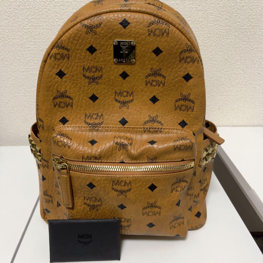 MCM ロゴリュック コニャック Sサイズ Medium Stark Packable Backpack in Monogram Nylon Cognac | MCM ®US
